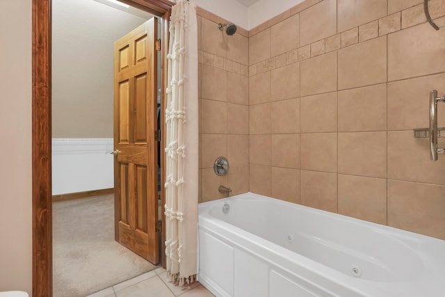 665 Cherrington Rd, Westerville, OH 43081 - bathroom featuring a combined bath / shower with jetted tub and tile patterned flooring