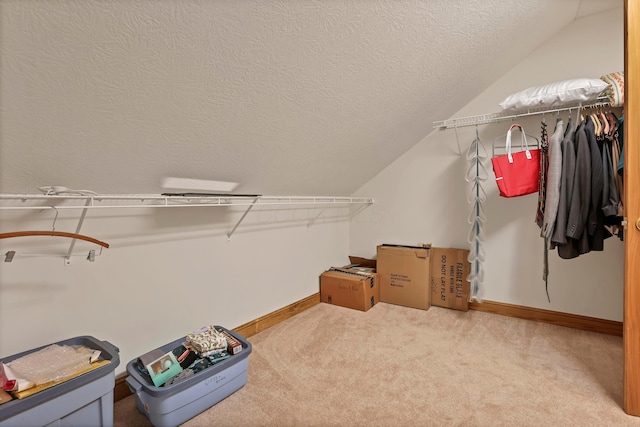 665 Cherrington Rd, Westerville, OH 43081 - walk in closet with vaulted ceiling and carpet flooring