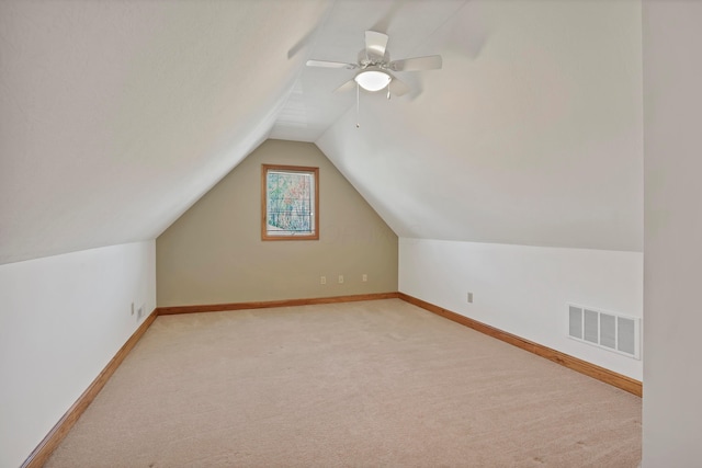 665 Cherrington Rd, Westerville, OH 43081 - additional living space with baseboards, vaulted ceiling, visible vents, and light carpet
