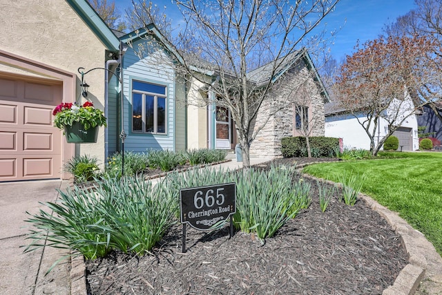 665 Cherrington Rd, Westerville, OH 43081 - exterior space featuring stucco siding and a front yard