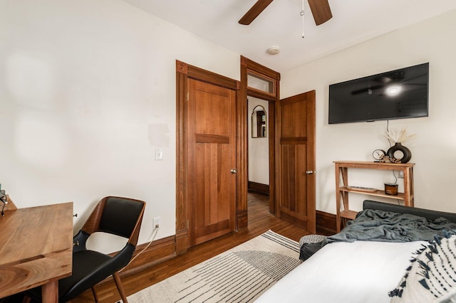 870 Oakwood Ave, Columbus, OH 43206 - bedroom featuring ceiling fan, baseboards, and wood finished floors