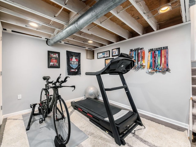 exercise area with baseboards