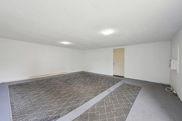 empty room featuring finished concrete flooring