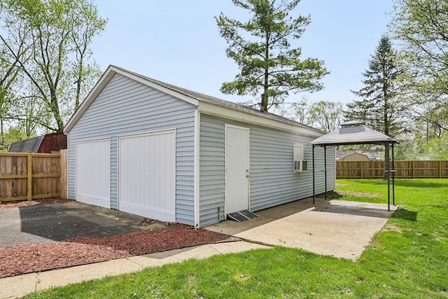 garage featuring fence