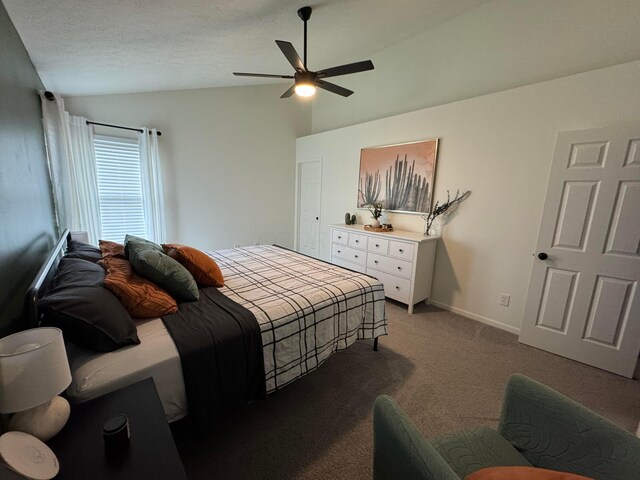 bedroom featuring ceiling fan, baseboards, carpet, and vaulted ceiling