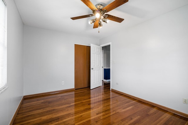 2852 Longfield Rd, Columbus, OH 43204 - empty room with wood finished floors, baseboards, and ceiling fan