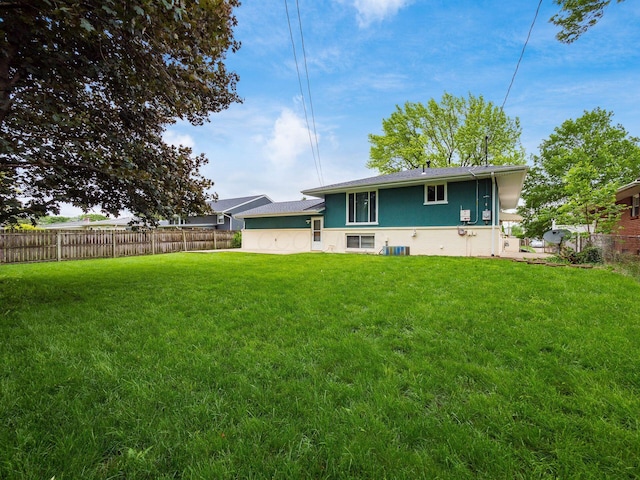 2852 Longfield Rd, Columbus, OH 43204 - back of property featuring stucco siding and central AC unit
