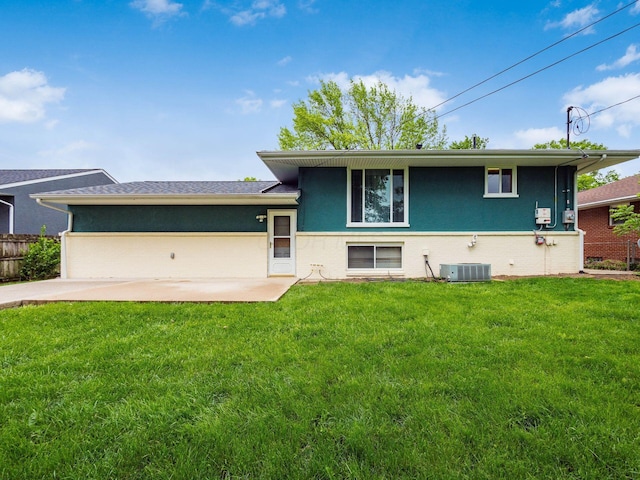 2852 Longfield Rd, Columbus, OH 43204 - view of front of property featuring a patio area, central AC unit, and stucco siding