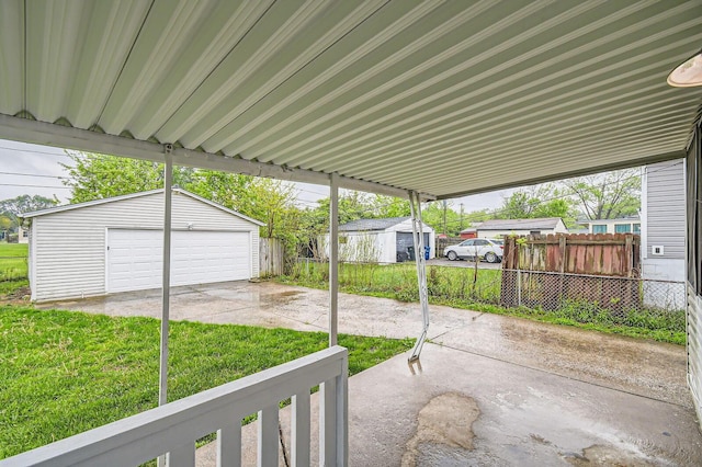 view of yard featuring a garage and an outdoor structure