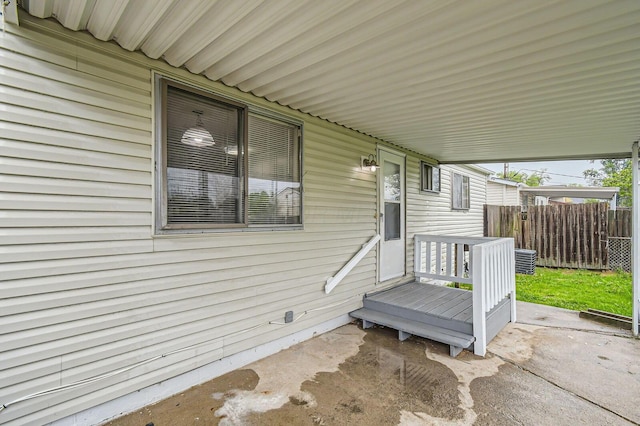 view of patio / terrace featuring fence