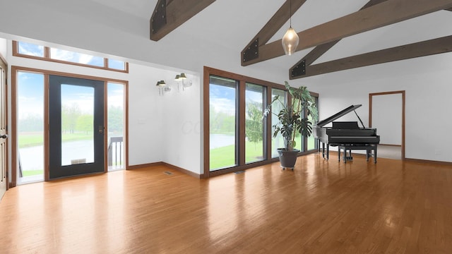 3448 Ostrander Rd, Ostrander, OH 43061 - foyer with beam ceiling, wood finished floors, baseboards, and high vaulted ceiling