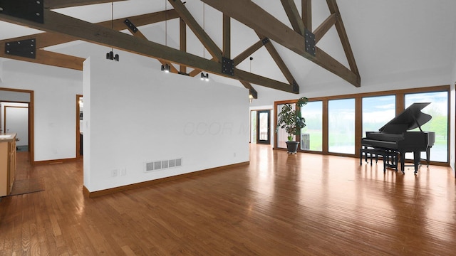 3448 Ostrander Rd, Ostrander, OH 43061 - living room with high vaulted ceiling, baseboards, healthy amount of natural light, beamed ceiling, and wood finished floors
