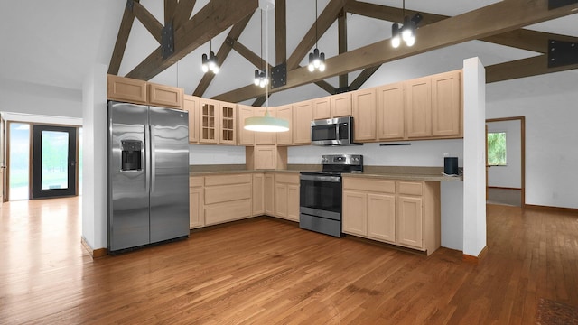 3448 Ostrander Rd, Ostrander, OH 43061 - kitchen featuring stainless steel appliances, light brown cabinets, high vaulted ceiling, beamed ceiling, and glass insert cabinets