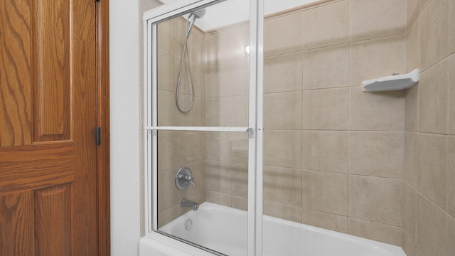 3448 Ostrander Rd, Ostrander, OH 43061 - bathroom featuring combined bath / shower with glass door