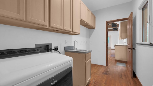 3448 Ostrander Rd, Ostrander, OH 43061 - laundry room with washer / clothes dryer, wood finished floors, cabinet space, and plenty of natural light