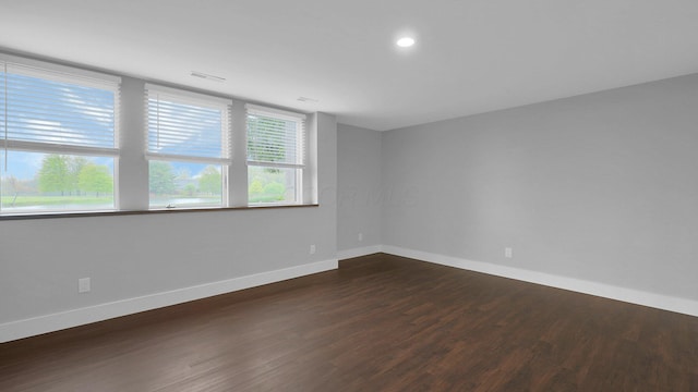 3448 Ostrander Rd, Ostrander, OH 43061 - empty room featuring dark wood-style floors, baseboards, and recessed lighting