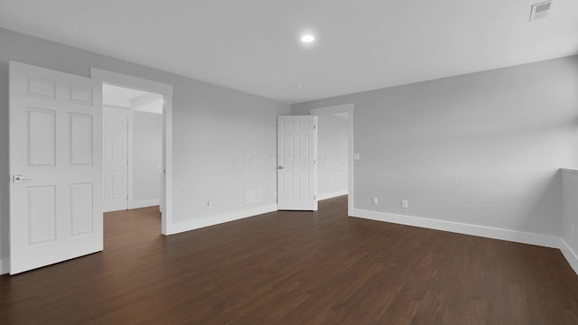 3448 Ostrander Rd, Ostrander, OH 43061 - unfurnished bedroom with baseboards, dark wood-style floors, and recessed lighting