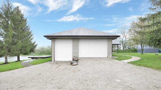 3448 Ostrander Rd, Ostrander, OH 43061 - view of outbuilding featuring a water view and an outbuilding