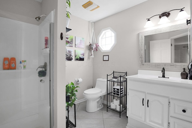 bathroom with tile patterned flooring, vanity, toilet, baseboards, and a stall shower