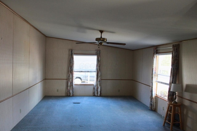 45 Ravine Ridge Dr, Delaware, OH 43015 - unfurnished room with a decorative wall, carpet, and a ceiling fan