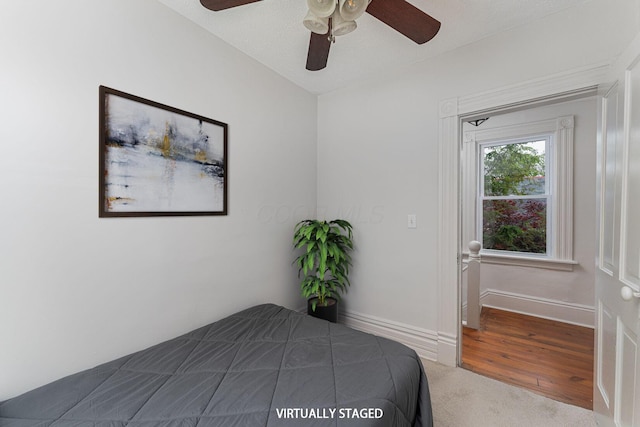 2381/2 E Whittier St, Columbus, OH 43206 - bedroom featuring a ceiling fan, baseboards, and carpet flooring