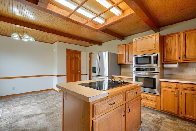 kitchen featuring stainless steel appliances, light countertops, beamed ceiling, and backsplash