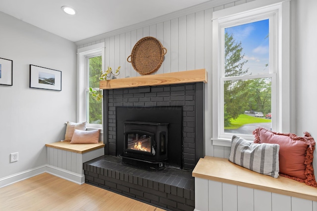 8019 Clouse Rd, New Albany, OH 43054 - detailed view of wood finished floors and a brick fireplace