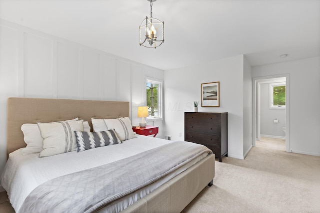 8019 Clouse Rd, New Albany, OH 43054 - bedroom featuring multiple windows, a chandelier, and light colored carpet