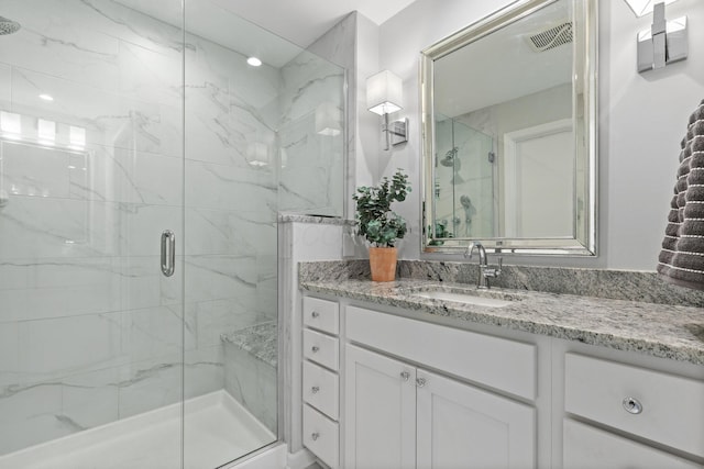 8019 Clouse Rd, New Albany, OH 43054 - bathroom featuring a marble finish shower and vanity