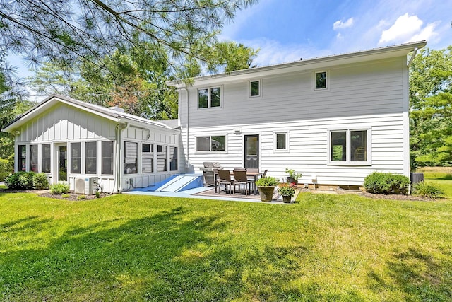 8019 Clouse Rd, New Albany, OH 43054 - rear view of property with a lawn, board and batten siding, and a patio