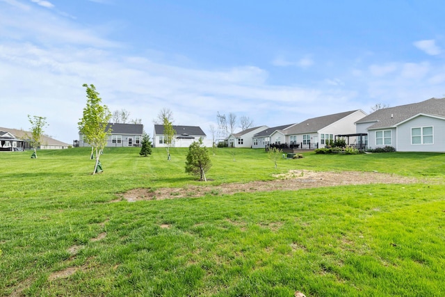 view of yard featuring a residential view