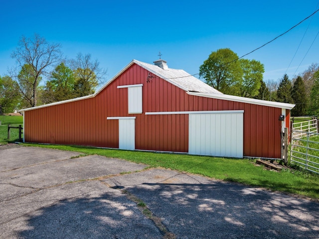 88 Tallman St, North Lewisburg, OH 43060 - view of outbuilding featuring an outdoor structure and fence