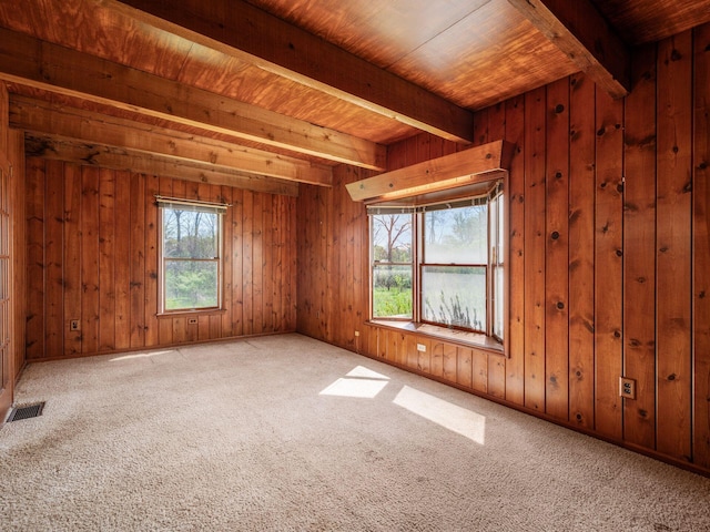 88 Tallman St, North Lewisburg, OH 43060 - spare room featuring visible vents, wood ceiling, carpet floors, and beam ceiling
