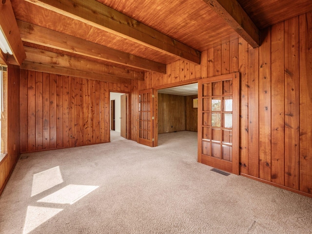 88 Tallman St, North Lewisburg, OH 43060 - empty room featuring carpet floors, wood ceiling, visible vents, and beamed ceiling
