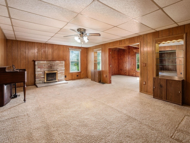 88 Tallman St, North Lewisburg, OH 43060 - unfurnished living room with wooden walls, ceiling fan, and a paneled ceiling