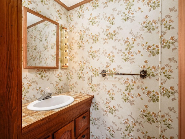 88 Tallman St, North Lewisburg, OH 43060 - bathroom with vanity, ornamental molding, and wallpapered walls