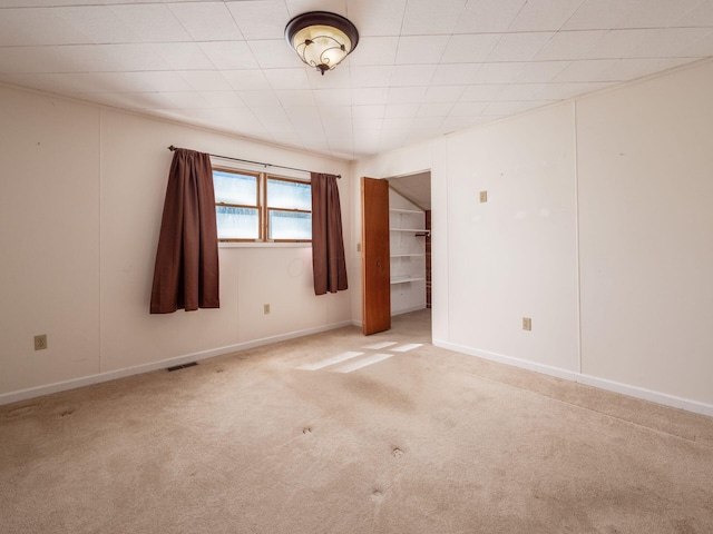 88 Tallman St, North Lewisburg, OH 43060 - unfurnished room featuring baseboards, carpet flooring, and visible vents