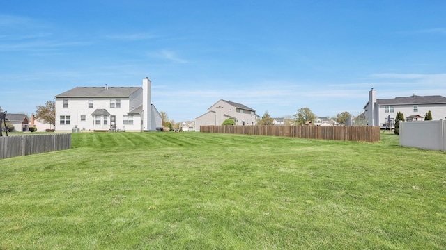 view of yard with fence