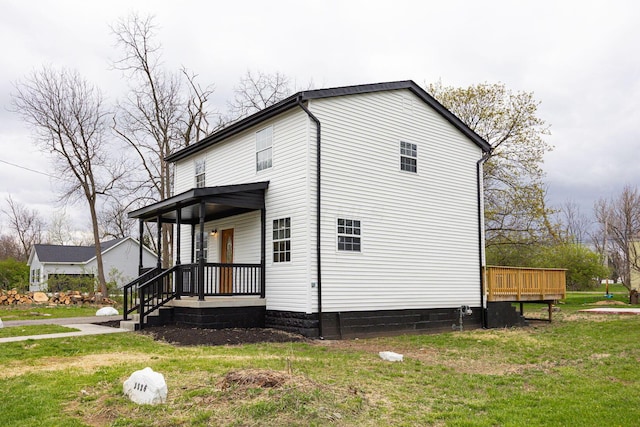 view of home's exterior featuring a yard