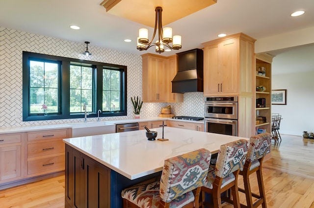 9730 Lancaster Kirkersville Rd NW, Baltimore, OH 43105 - kitchen with premium range hood, appliances with stainless steel finishes, light brown cabinets, and light wood-type flooring
