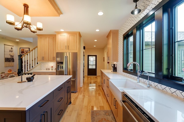9730 Lancaster Kirkersville Rd NW, Baltimore, OH 43105 - kitchen featuring a sink, a healthy amount of sunlight, light brown cabinetry, and stainless steel appliances