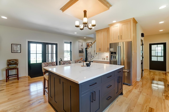 9730 Lancaster Kirkersville Rd NW, Baltimore, OH 43105 - kitchen featuring a notable chandelier, recessed lighting, stainless steel refrigerator with ice dispenser, light wood-style floors, and light brown cabinetry