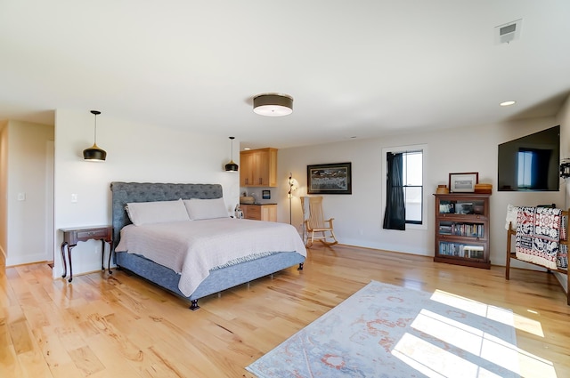 9730 Lancaster Kirkersville Rd NW, Baltimore, OH 43105 - bedroom featuring visible vents, baseboards, and light wood-type flooring