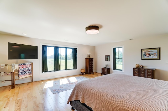 9730 Lancaster Kirkersville Rd NW, Baltimore, OH 43105 - bedroom featuring multiple windows, recessed lighting, and light wood finished floors