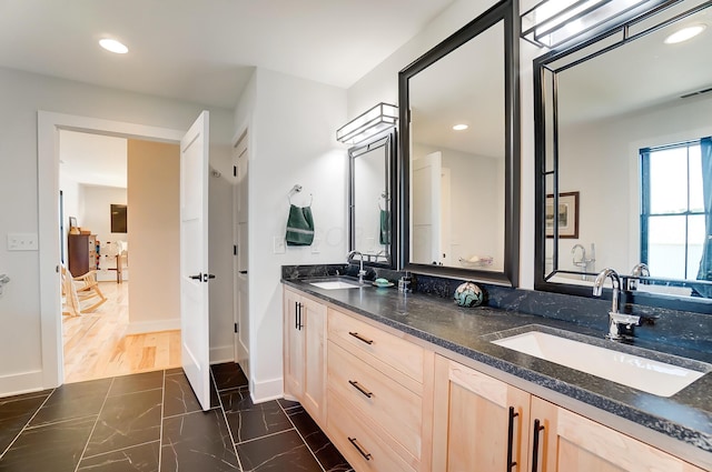 9730 Lancaster Kirkersville Rd NW, Baltimore, OH 43105 - full bathroom with a sink, visible vents, double vanity, and recessed lighting