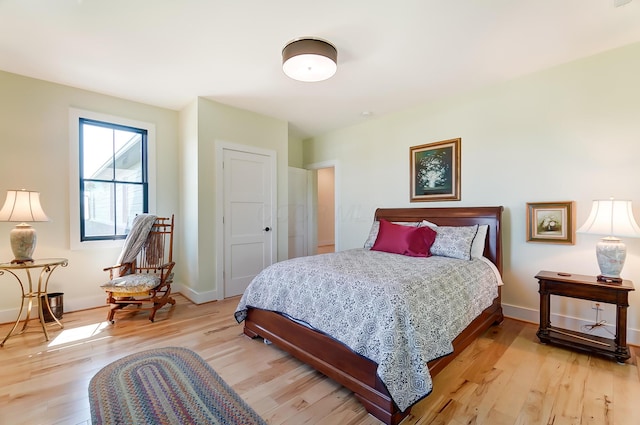 9730 Lancaster Kirkersville Rd NW, Baltimore, OH 43105 - bedroom with baseboards and light wood finished floors