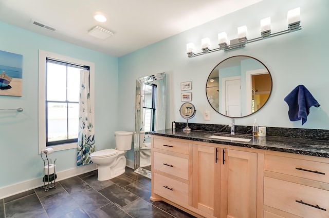 9730 Lancaster Kirkersville Rd NW, Baltimore, OH 43105 - bathroom featuring vanity, visible vents, baseboards, and toilet