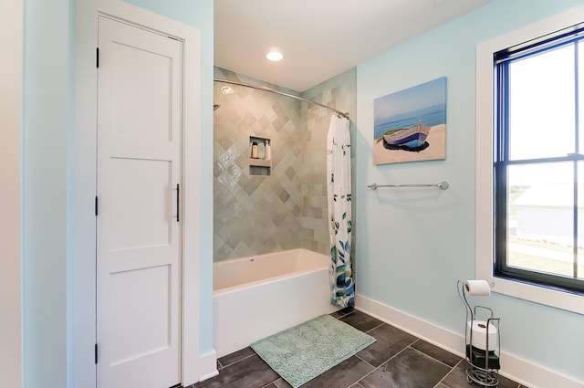 9730 Lancaster Kirkersville Rd NW, Baltimore, OH 43105 - bathroom featuring shower / bath combo, a wealth of natural light, tile patterned flooring, and baseboards