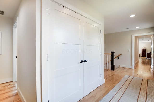 9730 Lancaster Kirkersville Rd NW, Baltimore, OH 43105 - hallway with baseboards, recessed lighting, an upstairs landing, visible vents, and light wood finished floors