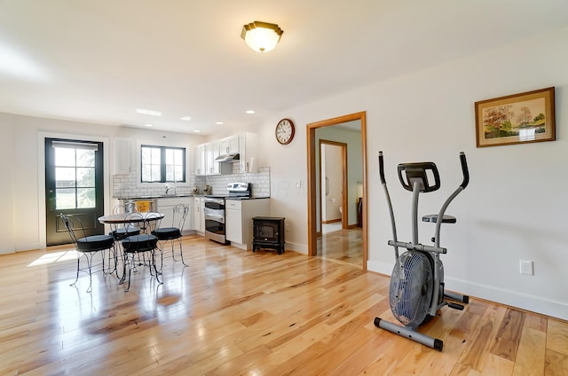 9730 Lancaster Kirkersville Rd NW, Baltimore, OH 43105 - interior space featuring recessed lighting, light wood-style floors, baseboards, and a sink